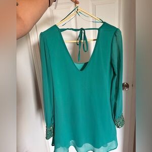 Flowy long sleeve Cocktail Dress – Teal, Open Back, and embellished cuffs